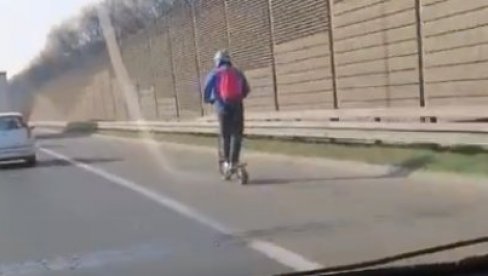 ŠOKANTAN SNIMAK SA AUTO-PUTA U BEOGRADU: Vozači nisu mogli da veruju šta vide - na električnom trotinetu juri zaustavnom trakom (VIDEO)