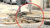 KOMBI PROPAO KROZ KALDRMU U CENTRU BEOGRADA: Napravila se rupa dok je vozilo stajalo na semaforu