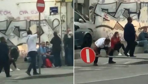 SNIMAK HAOSA U CENTRU BEOGRADA: Pobesneli čovek pravi lom usred dana, prolaznici u čudu, kamera sve snimila (VIDEO)