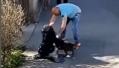 UZNEMIRUJUĆI VIDEO POTRESAO SRBIJU: Muškarac hladnokrvno šutirao ženu i psa na ulici (VIDEO)