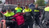DOZLOGRDILO: Holandska policija pretukla lažne ekologe - Greta Tunberg i ekipa rasterani vodenim topovima (VIDEO)