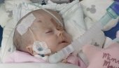 ЗА НИКОЛИЈУ СВАКИ УДАХ ВЕЛИКА БОРБА: Осмомесечна девојчица из Силбаша има тежак генетски поремећај, за кућно лечење треба 1.500 евра месечно