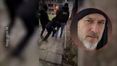 NAJNOVIJI SNIMCI HAPŠENJA NAPADAČA SA NOVOG BEOGRADA: Zverski izbo ženu devet puta pred detetom, pogledajte kako ga policija odvodi (VIDEO)