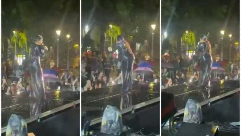 ПЉУСАК НИЈЕ МОГАО ДА ЈЕ ЗАУСТАВИ: Тања Савић певала на киши, није хтела да прекине концерт (ФОТО)