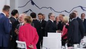 RAZGOVORI IZA KULISA SAMITA G7: Ko je izgubio sat, a ko prestao da puši? (VIDEO)