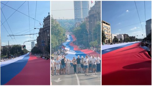 PRIZOR ODUZIMA DAH, NEMOGUĆE JU JE CELU SNIMITI: Srpsku trobojku nosi 2.500 ljudi, dugačka je 500 metara, a teška oko tonu (FOTO/VIDEO)
