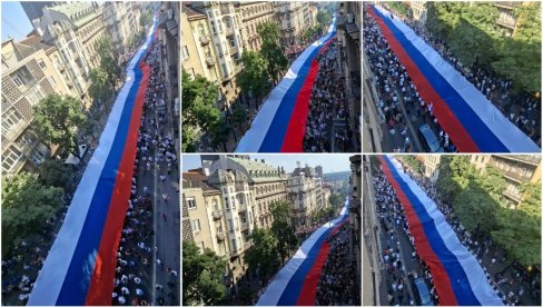 PRIZOR ODUZIMA DAH, NEMOGUĆE JU JE CELU SNIMITI: Srpsku trobojku nosi 2.500 ljudi, dugačka je 500 metara, a teška oko tonu (FOTO/VIDEO)